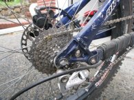 Rear derailleur and cassette